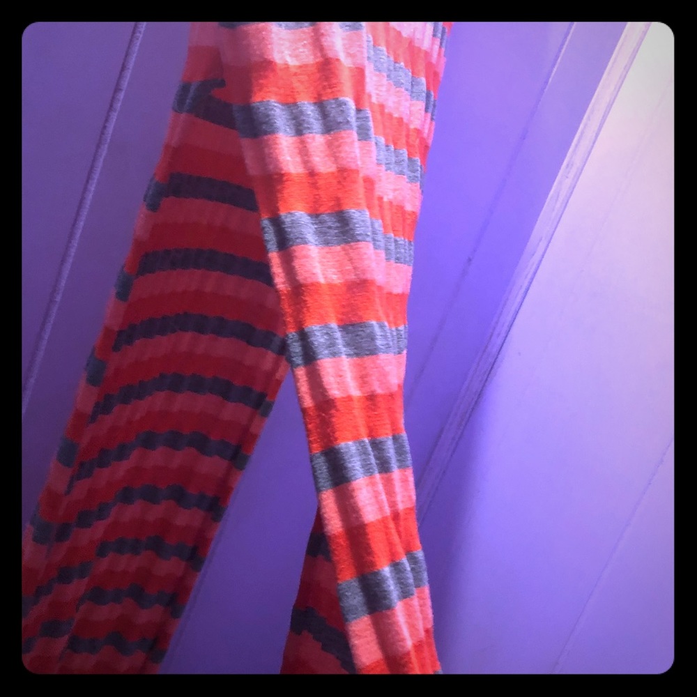 A dress with gray , Orange, and light pink